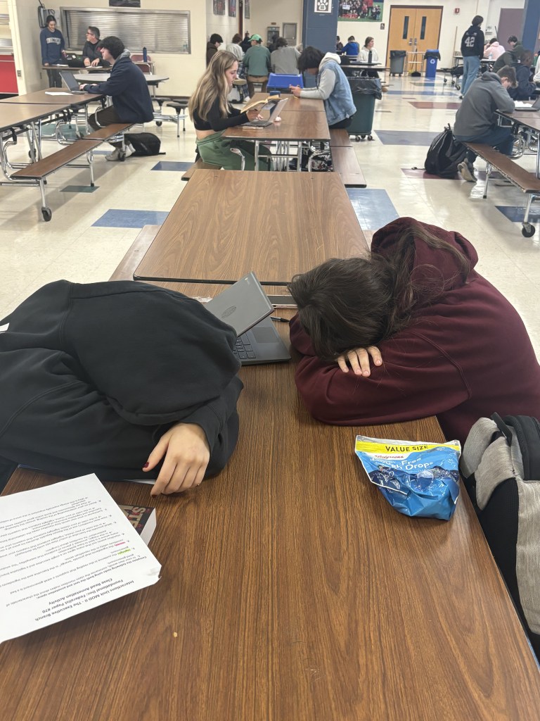 Students taking a quick nap during study hall